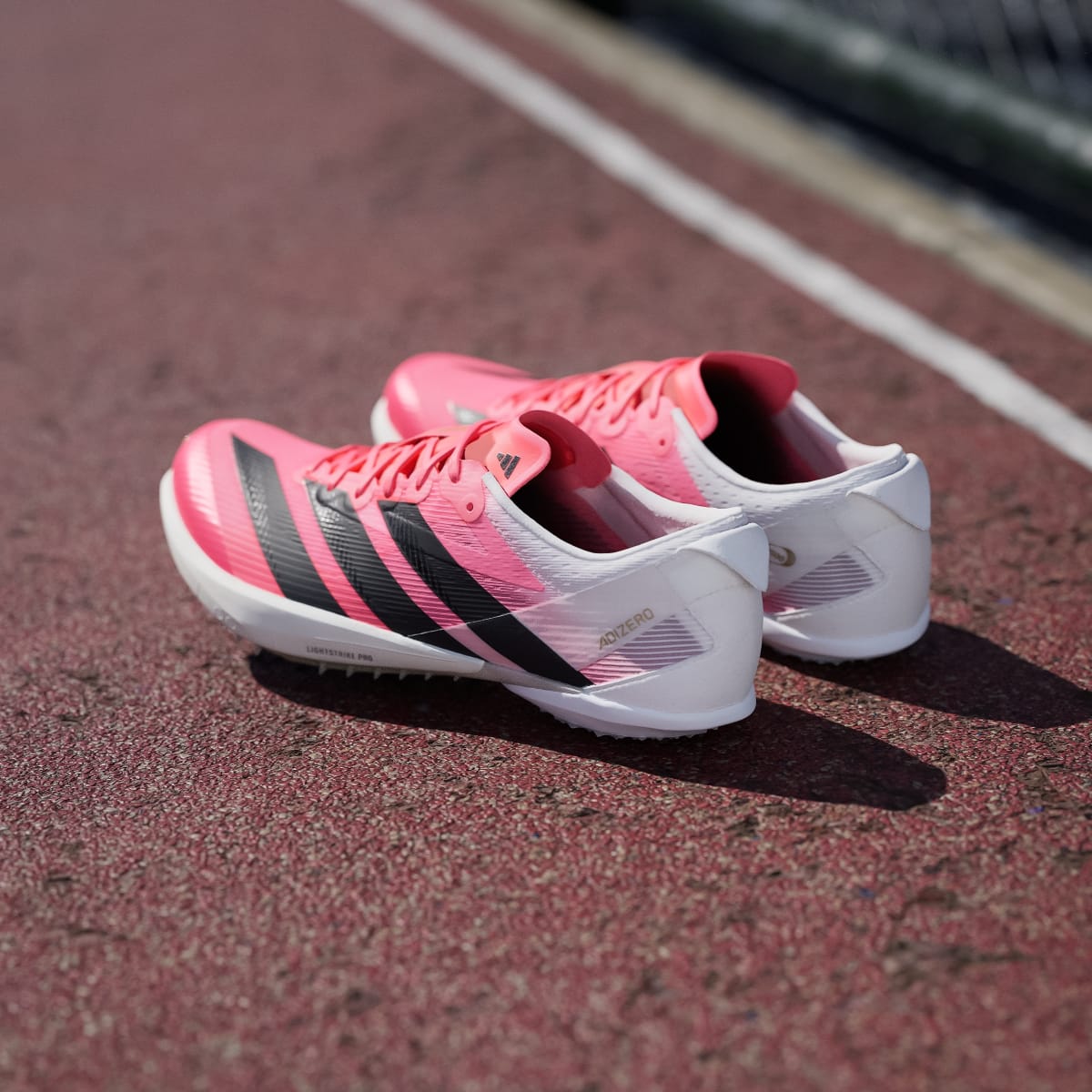 Adidas Women's ADIZERO AMBITION Shoes - Solar Turbo / Core Black / Gold Metallic - Image 6