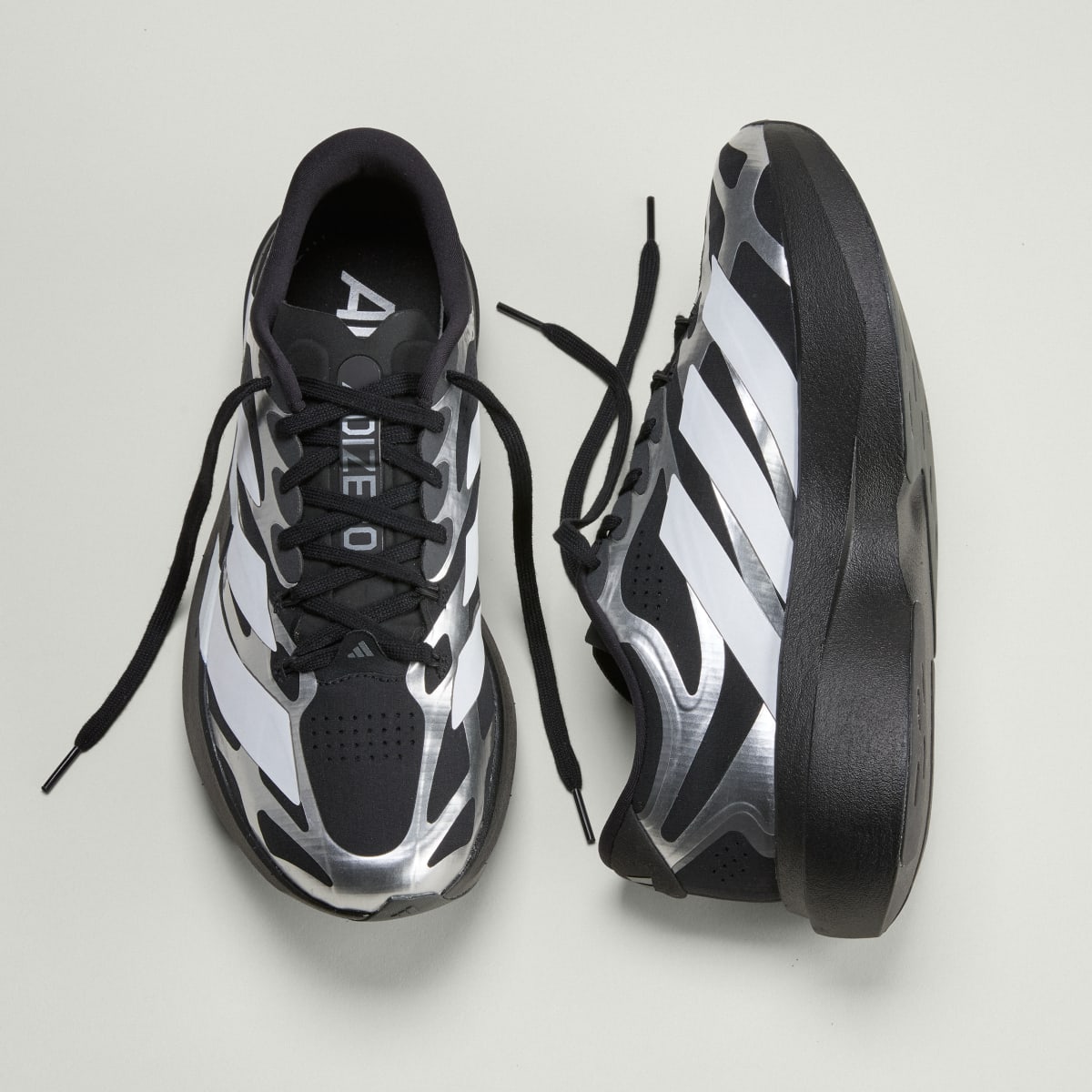 Adidas Men's ADIZERO EVO SL EXO Shoes - Core Black / Cloud White / Iron Metallic - Image 4