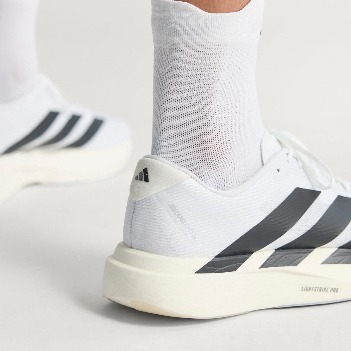 Adidas Men's Adizero EVO SL Shoes - Cloud White / Core Black / Cloud White - Image 9