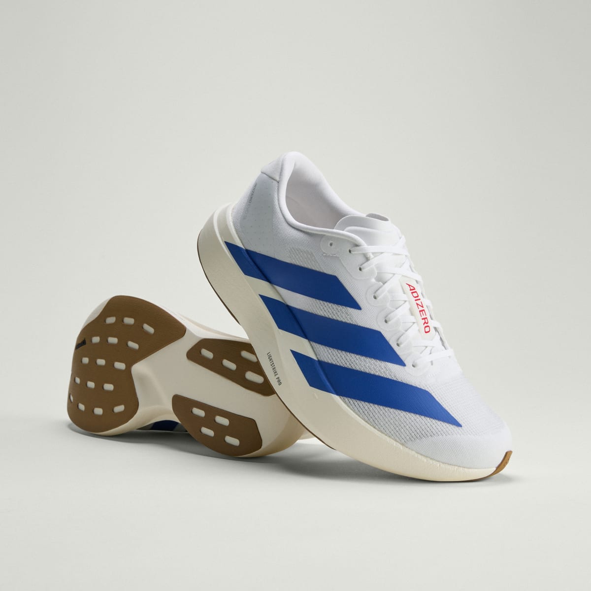 Adidas Men's Adizero EVO SL Shoes - Cloud White / Royal Blue / Pure Ruby - Image 1