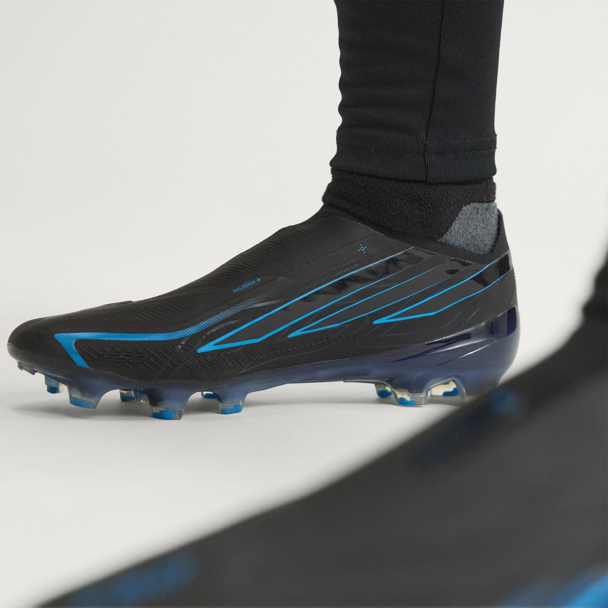 Adidas Men's F50 HYPERFAST ELITE Laceless Firm Ground Cleats - Core Black / Core Black / Lucid Ray Blue - Image 8