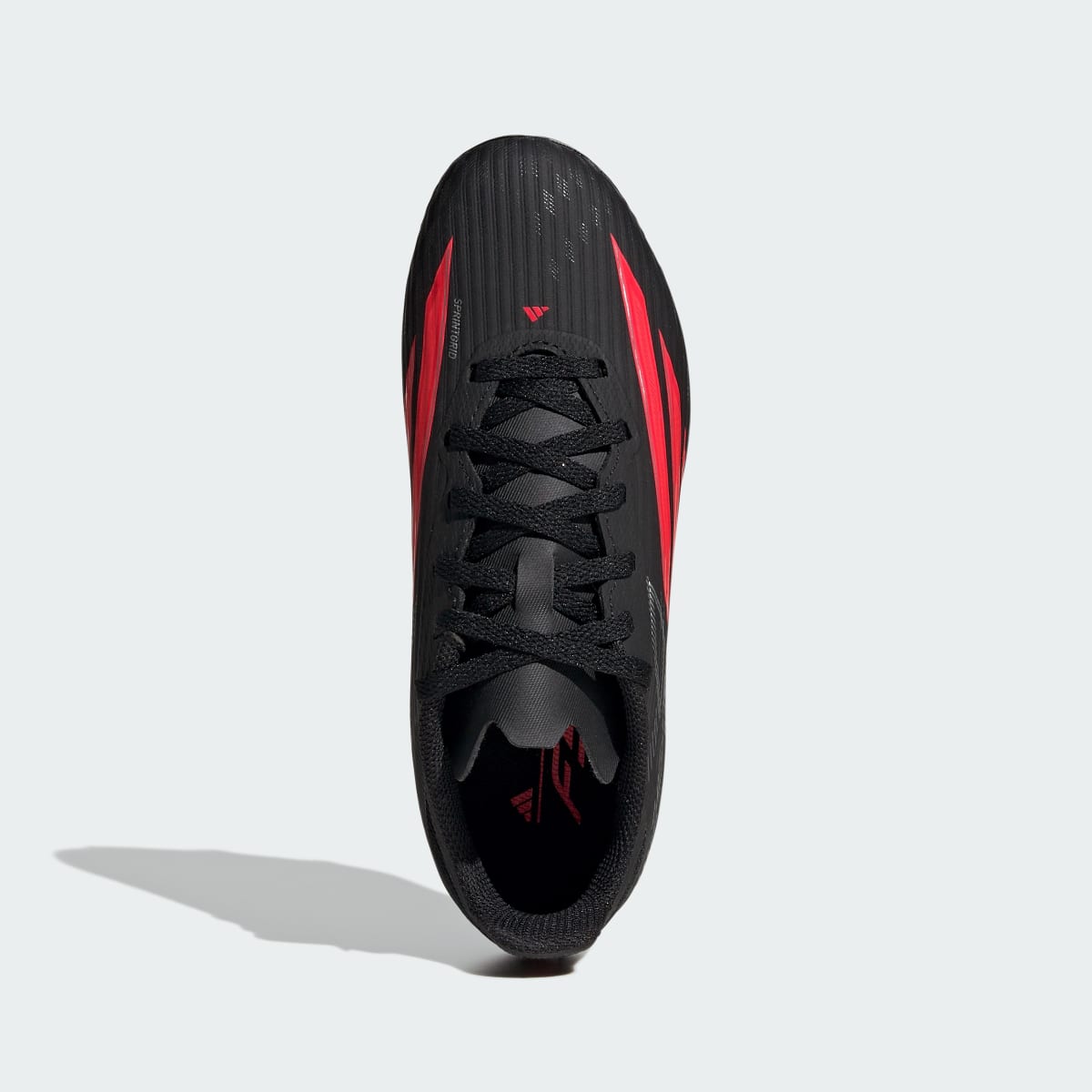 Adidas Kids' F50 LEAGUE Firm Ground / Multi Ground Soccer Cleats Kids - Core Black / Lucid Red / Core Black - Image 3